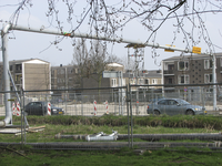 907645 Gezicht op het bouwrijp maken van het terrein tussen de Talmalaan en de Troelstralaan (achtergrond) te Utrecht, ...